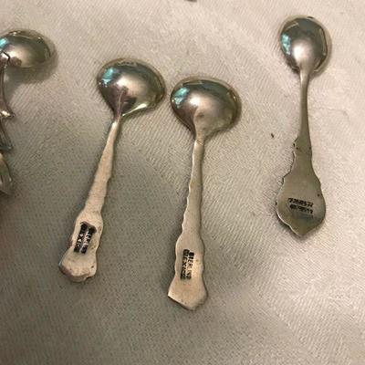 Lot 85 - Sterling Silver Salt Spoons and Baby Rattle