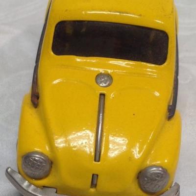 Vintage Yellow Volkswagen Toy Car