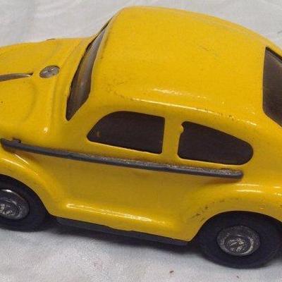 Vintage Yellow Volkswagen Toy Car