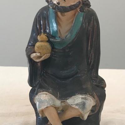 Chinese Male Sitting with Vase Figurine