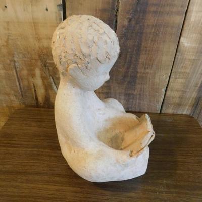 Clay Sculpture of Child Reading Book