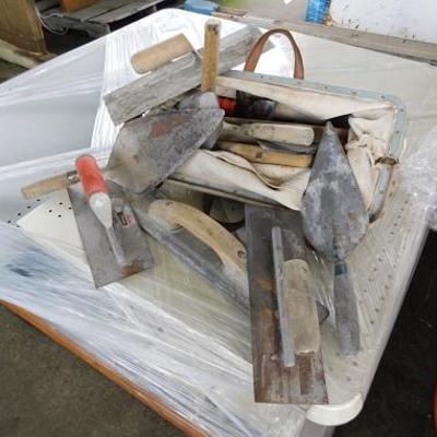 Approximately Two Dozen Commerical Brand Trowels and Floats