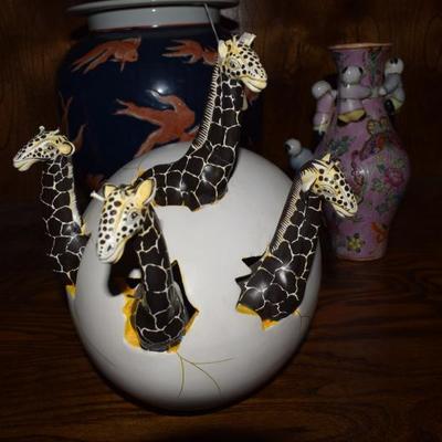 Giraffes Popping Out of Egg by Lourdes Rodriquez