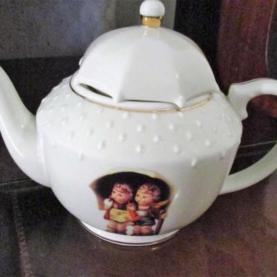 Hummel Tray and Porcelain Tea Set See all photos 