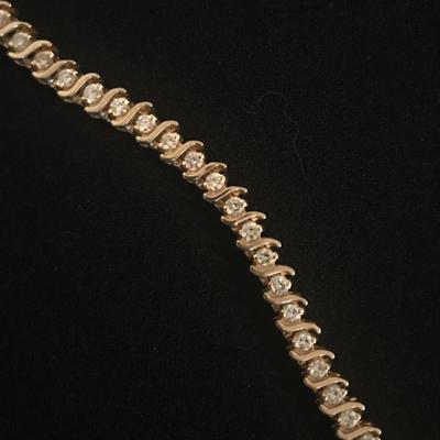 Lot 38 - S Curve Diamond Tennis Bracelet