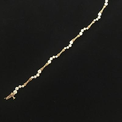 Lot 39 - 14K Gold with CZ Bracelet, Pin and Earrings