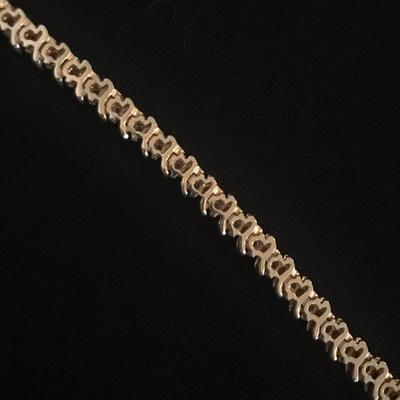 Lot 38 - S Curve Diamond Tennis Bracelet