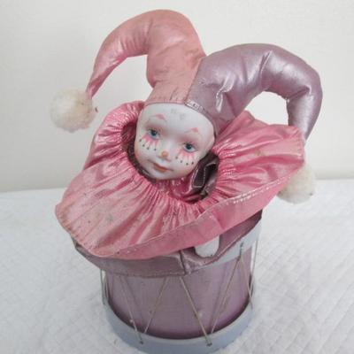 Porcelain Jester In A Drum 