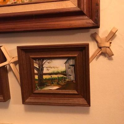Framed Painted Artworks and table
