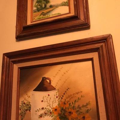 Framed Painted Artworks and table