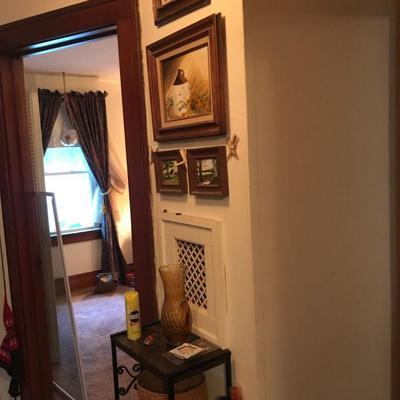Framed Painted Artworks and table