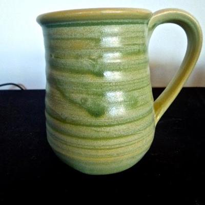 Lot 37: Four Stoneware Handmade Pottery Mugs 