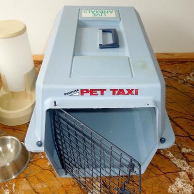 Lot 97:  Two Cat Carriers and Pet Feeding Bowls
