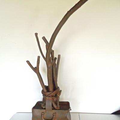 Lot 110: Leather Satchel and Branches Sculpture