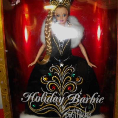 LOT 30  New in Box Holiday Barbies