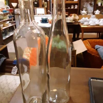 Set of 2 clear wine bottles