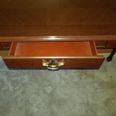 Cherry color wood sofa table with drawer