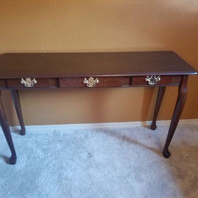 Cherry color wood sofa table with drawer