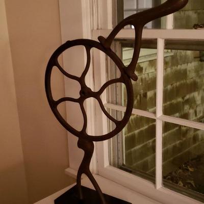 Man on Wheels Metal Sculpture by Harry Neyer