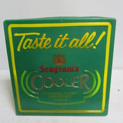 Original Embossed Stamped Taste It All!  Seagram's Cooler Advertisng Sign