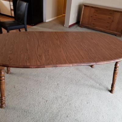 Solid Wood Dining Table with Two Leaves
