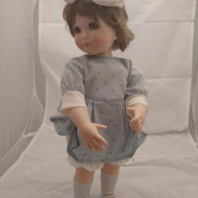 Lot 454. girl doll M.L.A 1999