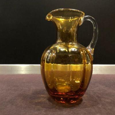 SMALL AMBER GLASS PITCHER OR CREAMER 