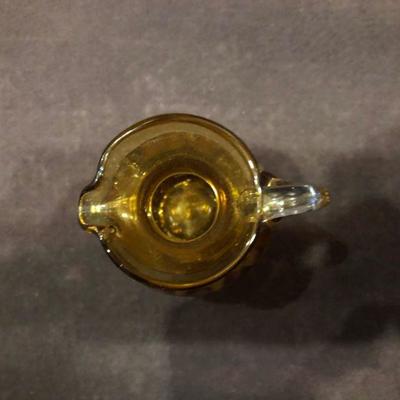 SMALL AMBER GLASS PITCHER OR CREAMER 