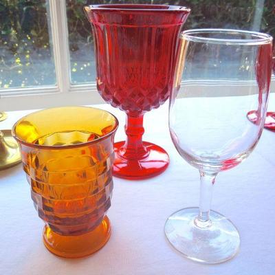 Lot 172: Colored Glassware and Brass Candlesticks