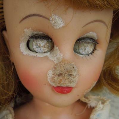 Lot 230: 1960's Metal Doll Case, Doll and Homemade Doll Clothes