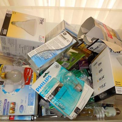 Lot 273: Stacking Shelves, Bins, Bathroom Scales, Lightbulbs and Paper Goods