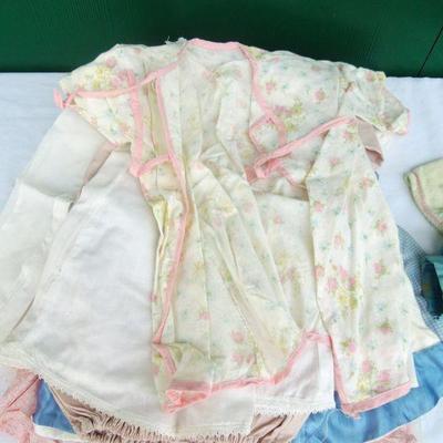 Lot 231: 1960's Latex Doll, Case and Homemade Clothes