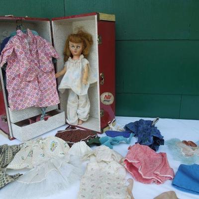 Lot 230: 1960's Metal Doll Case, Doll and Homemade Doll Clothes