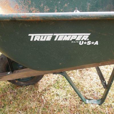 Lot 254: True Temper Wheel Barrow and Yard Art
