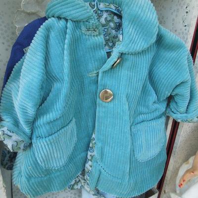 Lot 230: 1960's Metal Doll Case, Doll and Homemade Doll Clothes