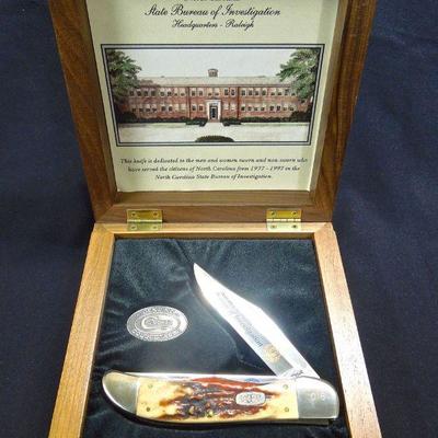 Lot 136: State Bureau of Investigation Collectibles with Knife