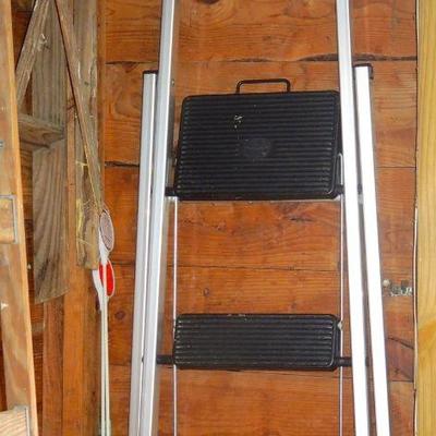 Lot 252: Four Ladders and 3 Extension Cords on Reels