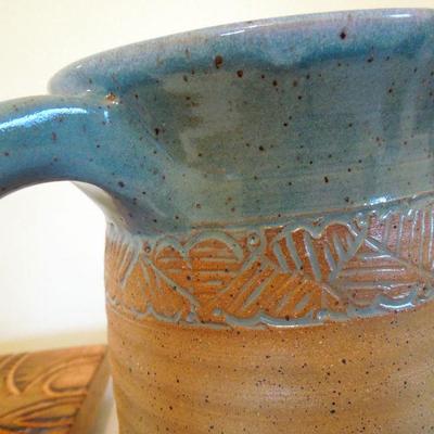Lot 151: Carved Wood Boards and Local Pottery