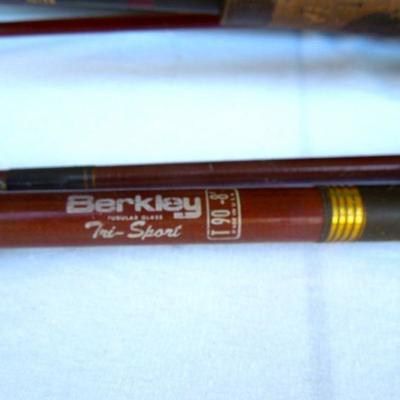 Lot 235: 2 Vintage Berkley Cork Fishing Poles, Penn Reels and Wood Model Skiff