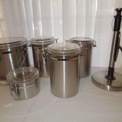 Lot 184: 5 Stainless Canisters and Stainless Towel Dispenser
