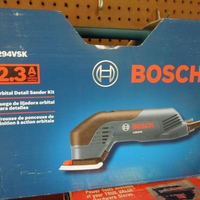 Lot 245: Large Lot of Power Tools in Boxes, Old Metal Tool Box and more