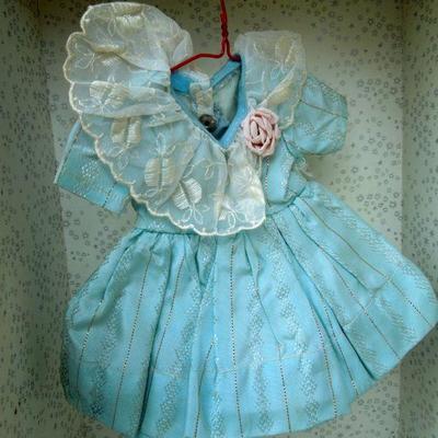 Lot 230: 1960's Metal Doll Case, Doll and Homemade Doll Clothes