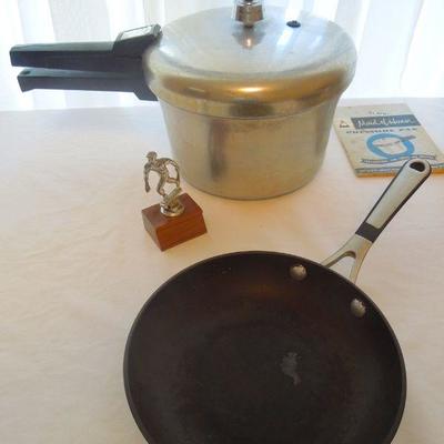 Lot 182: Pressure Cooker, Pots, Pans Trophies