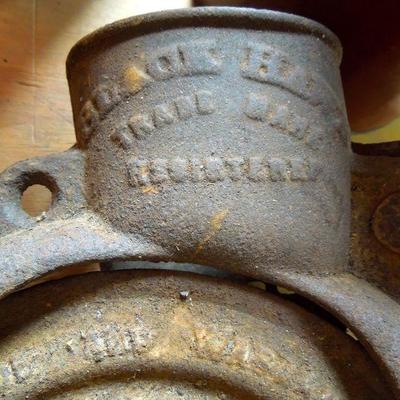 Lot 246: Antique Iron Sheller and Vintage tin Canisters