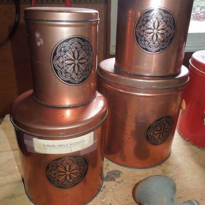 Lot 246: Antique Iron Sheller and Vintage tin Canisters