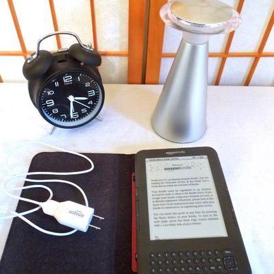 Lot 155: Amazon Kindle in Case, Touch Lamp and Alarm Clock