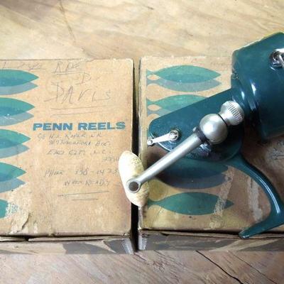 Lot 235: 2 Vintage Berkley Cork Fishing Poles, Penn Reels and Wood Model Skiff