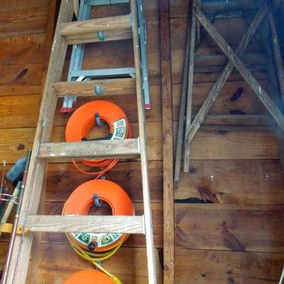 Lot 252: Four Ladders and 3 Extension Cords on Reels