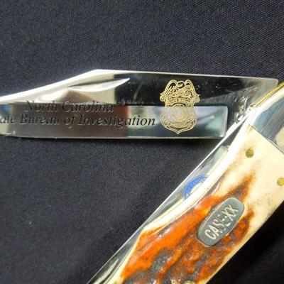 Lot 136: State Bureau of Investigation Collectibles with Knife