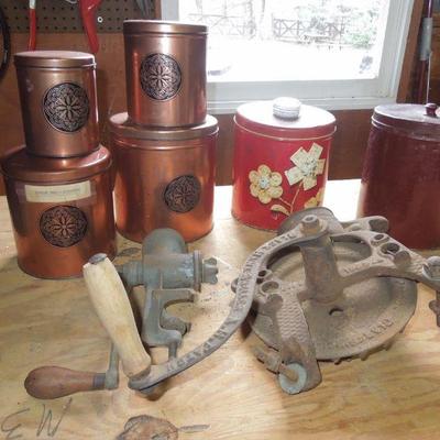 Lot 246: Antique Iron Sheller and Vintage tin Canisters